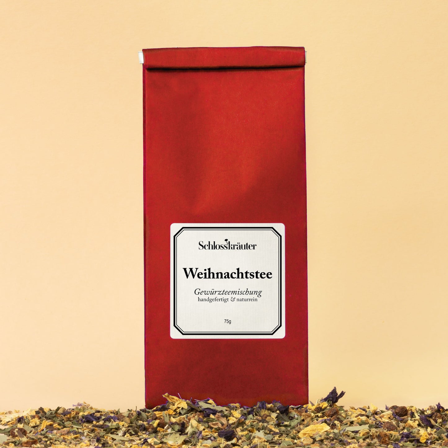 Weihnachtstee in rotem Beutel